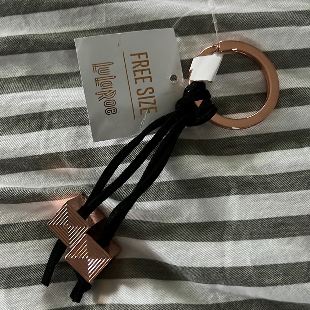BNWT LULAROE keychain with gold cubes